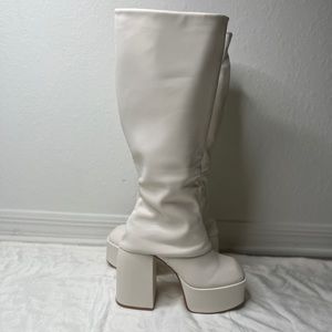 Brand new Cream EGO knee high platforms